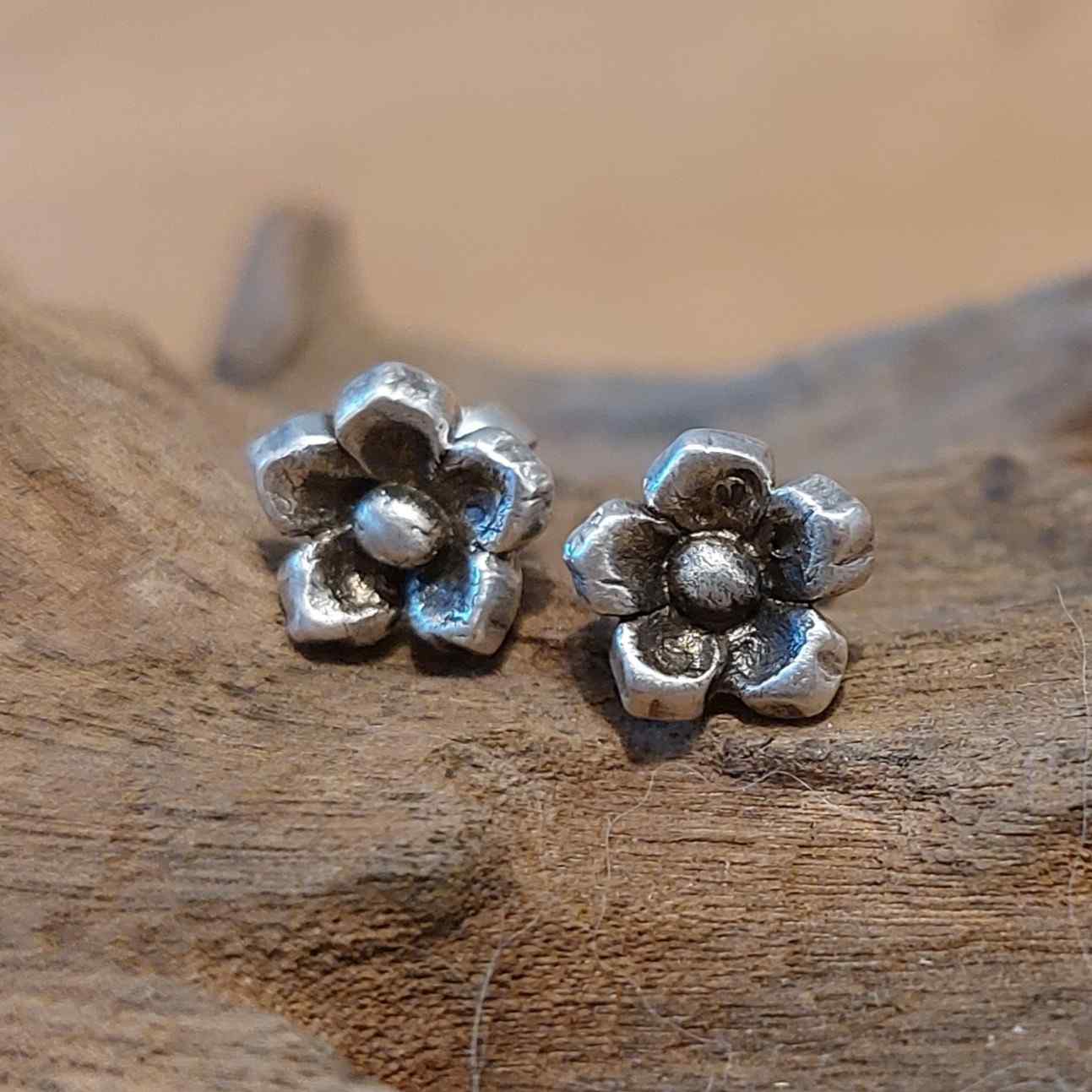 Custom-made silver earrings created in a Creative Jewelry Workshop Basel, transformed from silver clay into fine silver jewelry.