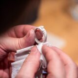 Hands creating a jewelry piece from Art Clay Silver during the workshop – creative group activity for company event, excursion, family celebration or as a unique birthday gift in Basel.