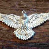 Handmade silver jewelry piece created in a creative jewelry workshop in Basel – unforgettable team event and teambuilding activity with lots of fun.